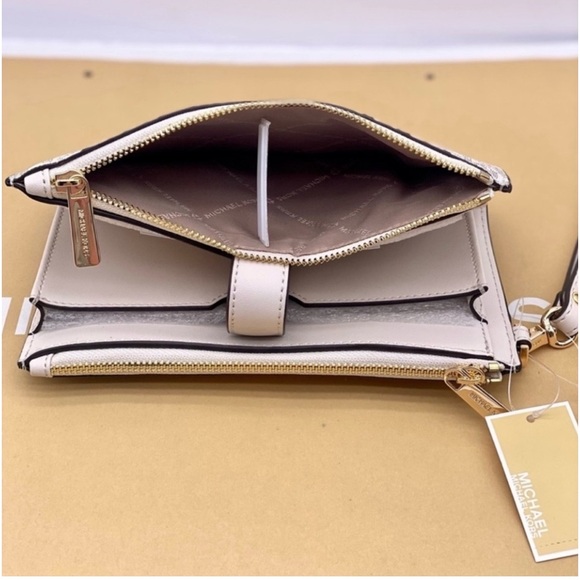 MICHAEL KORS LG
DOUBLE ZIP
WRISTLET
WALLET PHONE
HOLDER LIGHT
CREAM MULTI - Picture 7 of 12